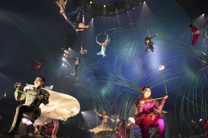 Cirque du Soleil members performing in 