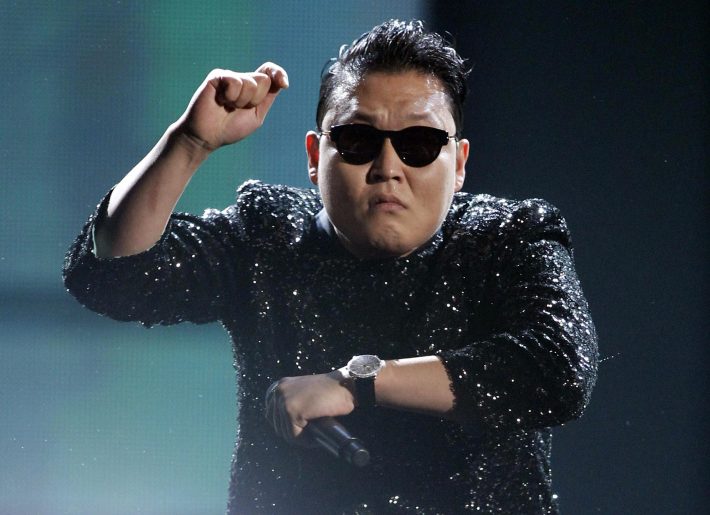 South Korean rapper Psy performs "Gangnam Style" at the 40th American Music Awards in Los Angeles, California, in this November 18, 2012 file photo. Psy's music video "Gangnam Style" became the most watched item on YouTube on November 24, 2012, with over 800 million views. REUTERS/Danny Moloshok/Files (UNITED STATES - Tags: ENTERTAINMENT SOCIETY)
